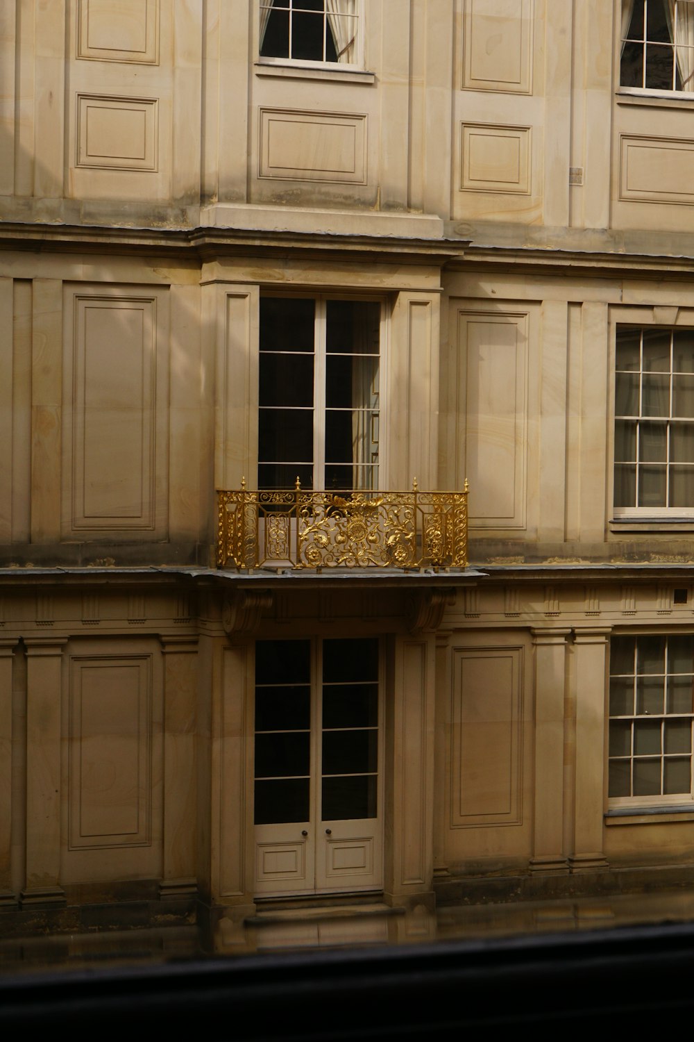 a building with a balcony and a balcony