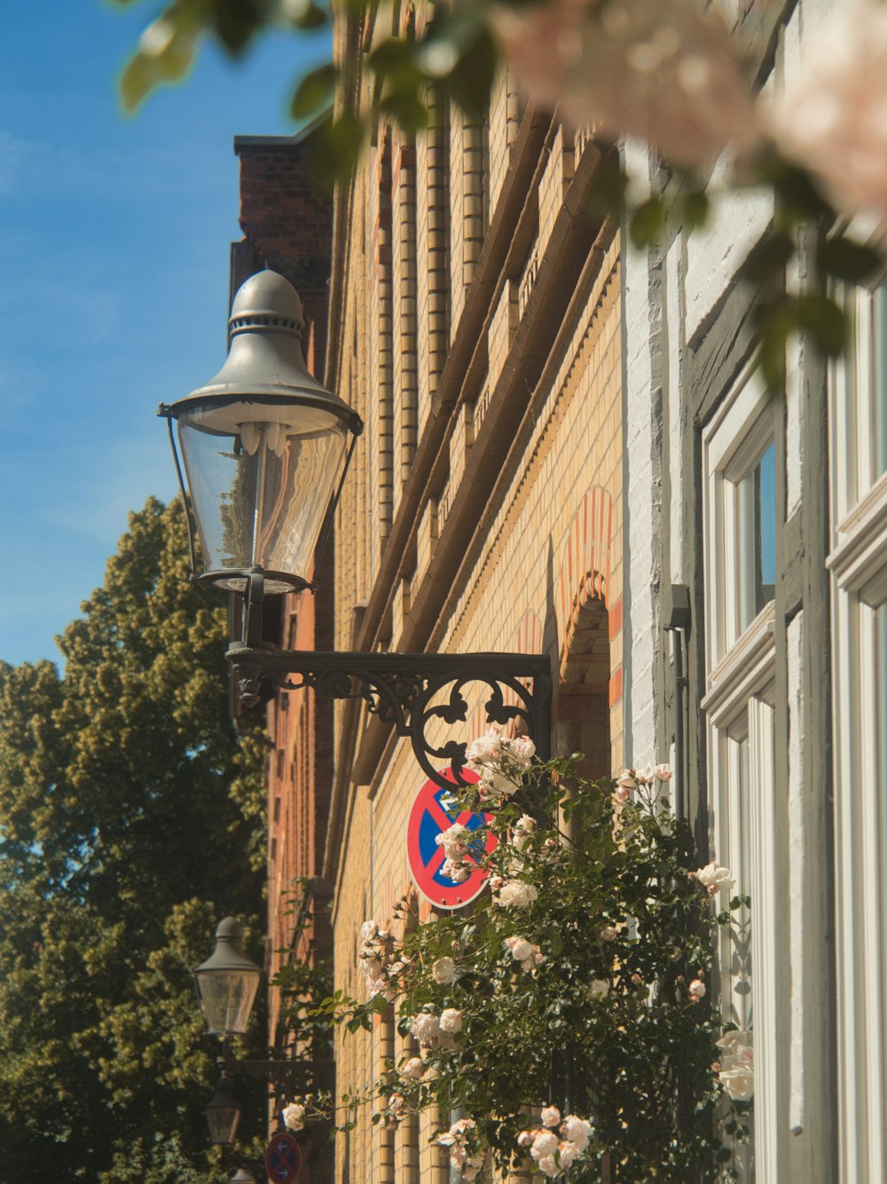 a street light on the side of a building