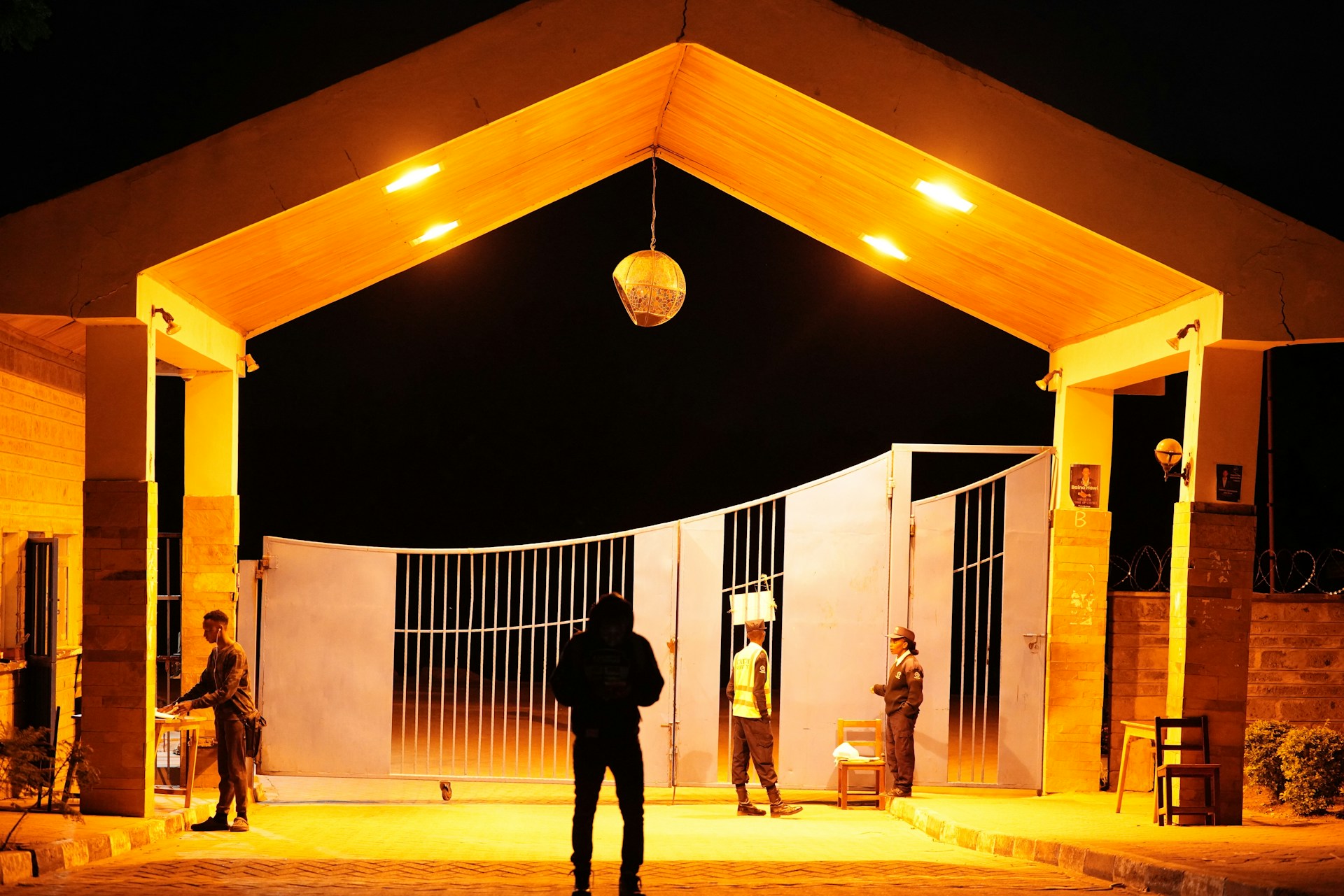 woman wearing yellow long-sleeved dress under white clouds and blue sky during daytime