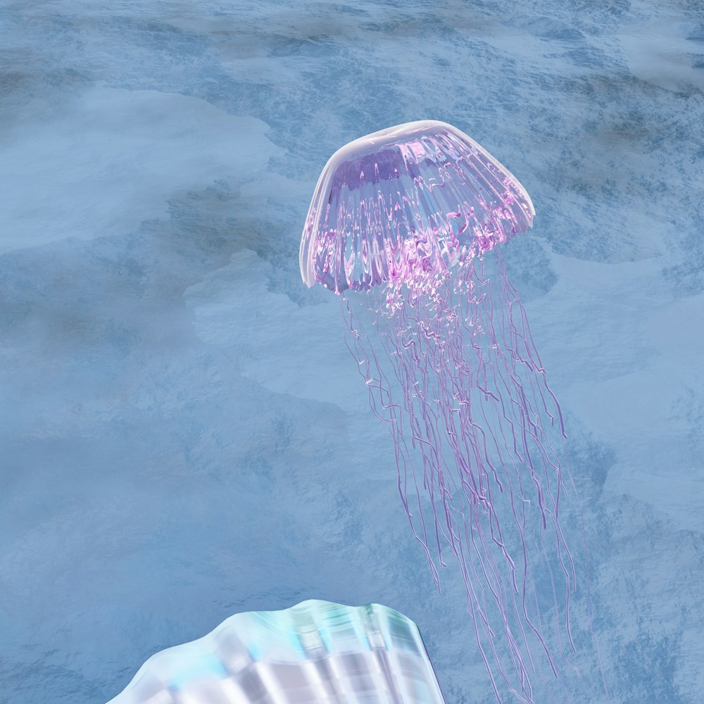 a pink jellyfish floating in a pool of water