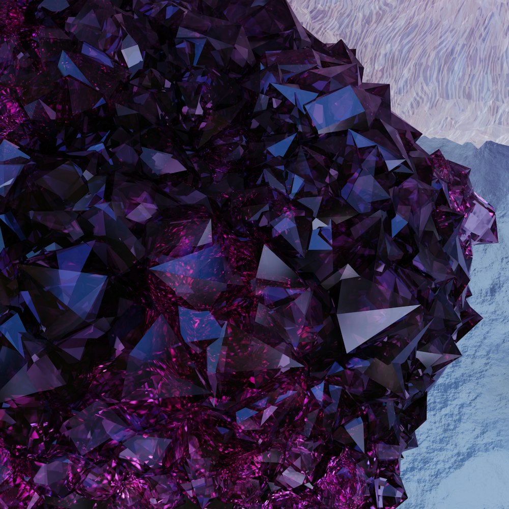 a pile of purple crystals sitting on top of a table