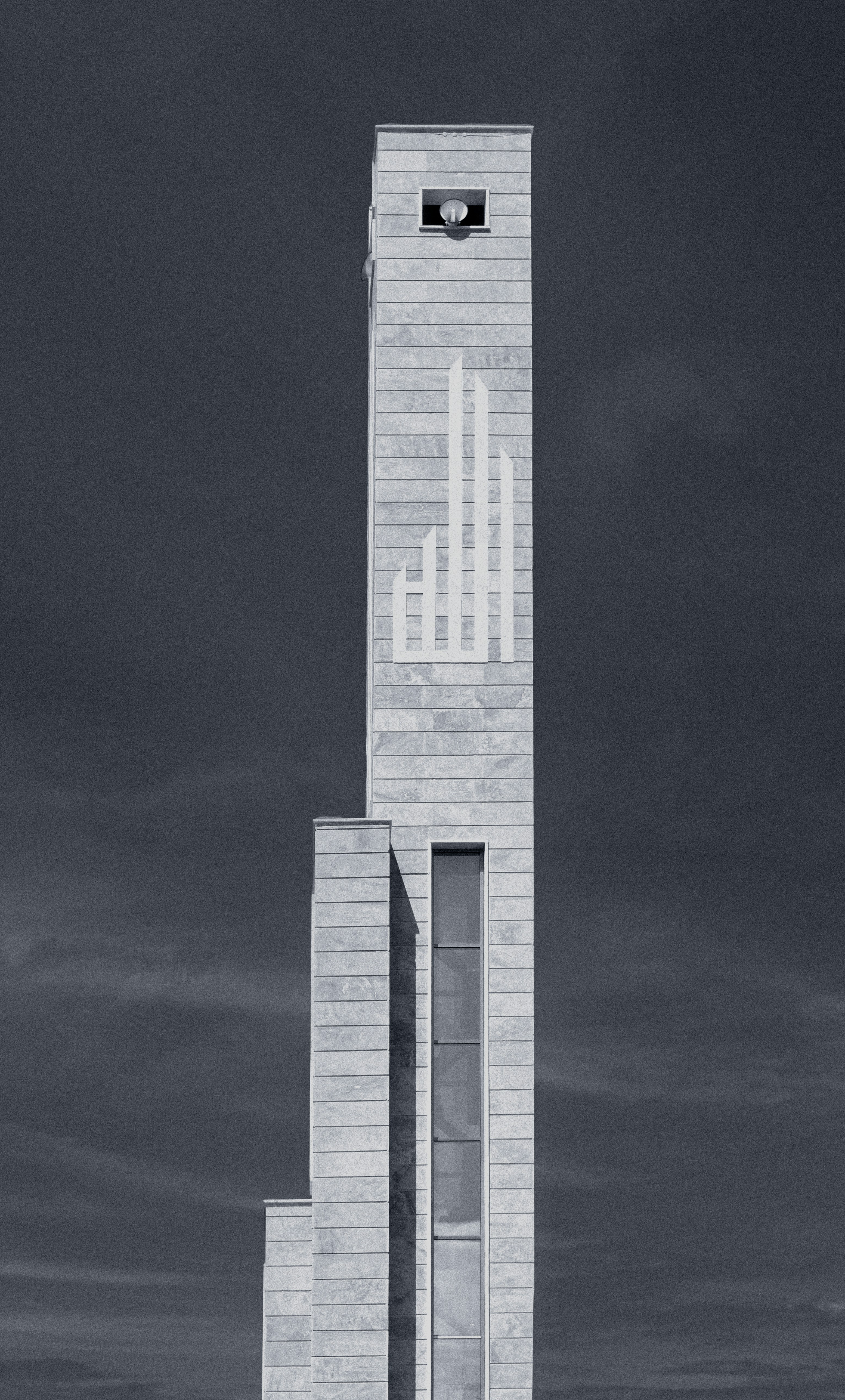 a tall building with a clock on the side of it