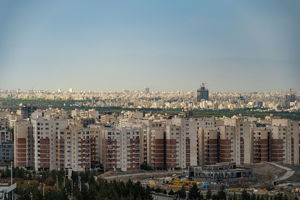 a view of a city with tall buildings