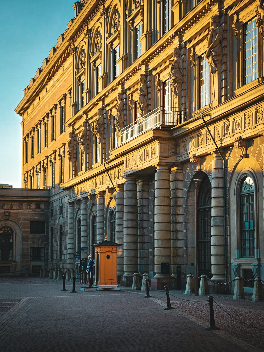 a large building with a clock on the front of it