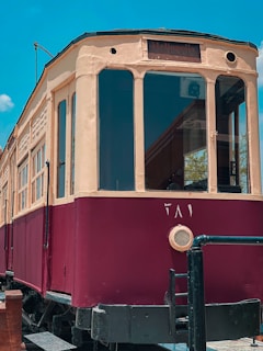 A scenic view of a tram moving through a historic part of Cairo.