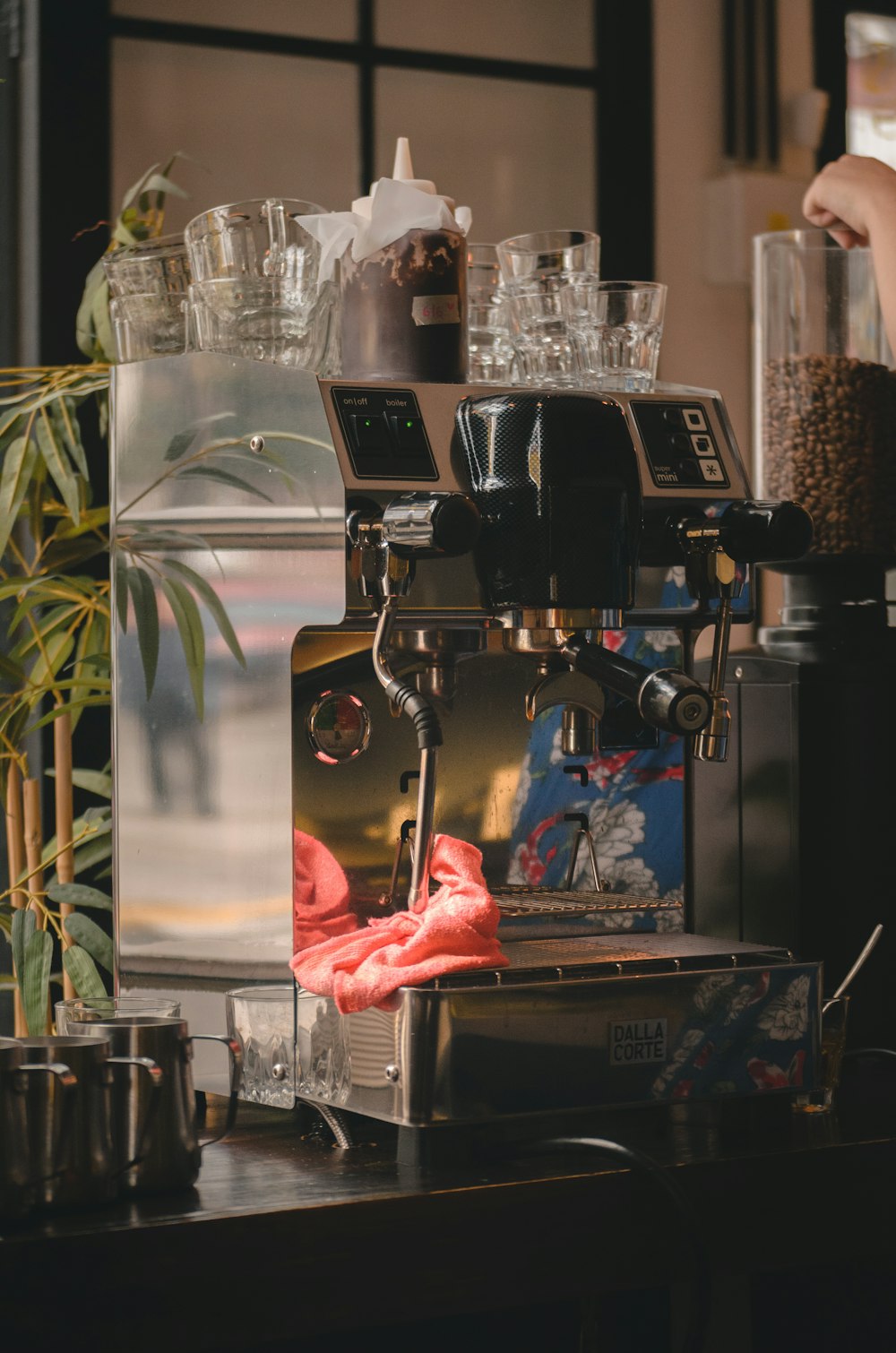 a coffee machine sitting on top of a wooden table