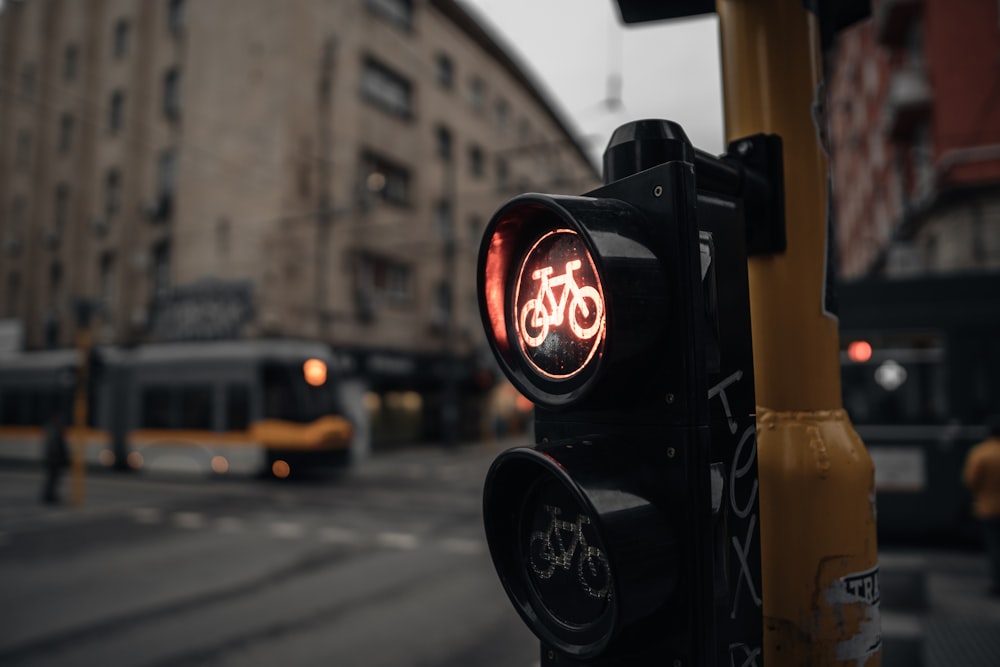 a traffic light with a bicycle symbol on it