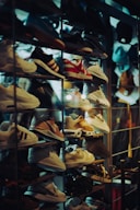 a display case filled with lots of shoes