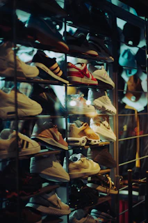 a display case filled with lots of shoes
