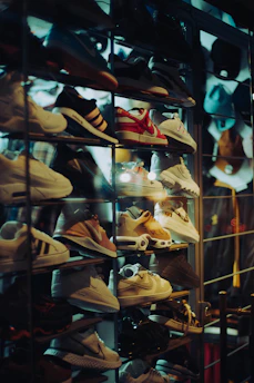 a display case filled with lots of shoes