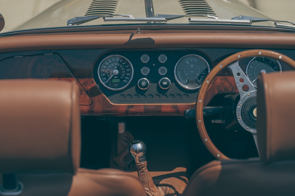 the dashboard of a classic sports car