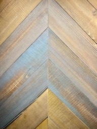 a close up of a wooden wall made of boards
