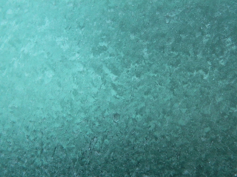 a close up view of a frosty window