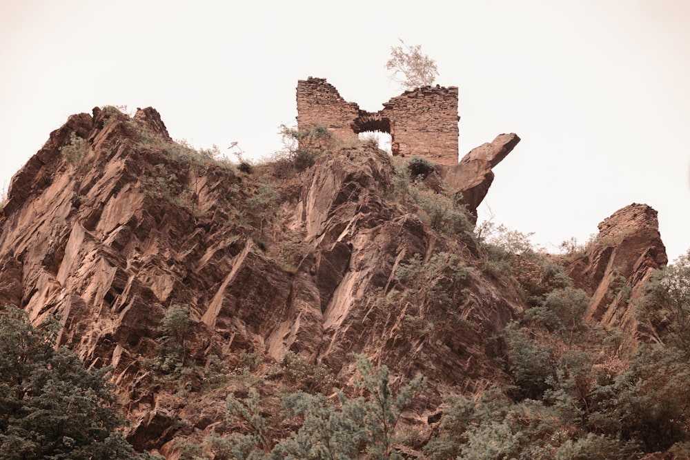 a large rock formation with a window in the middle of it