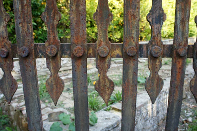 Close-up of wrought iron decorative elements with rustic texture