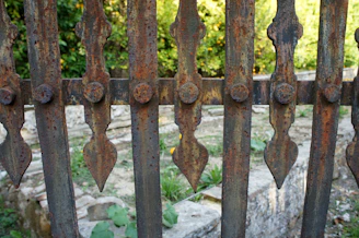 Close-up of wrought iron decorative elements with rustic texture
