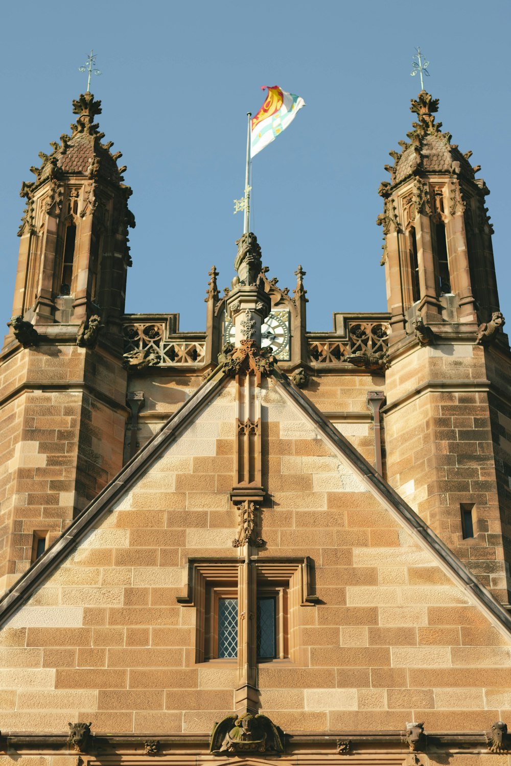 a tall building with a clock on the top of it