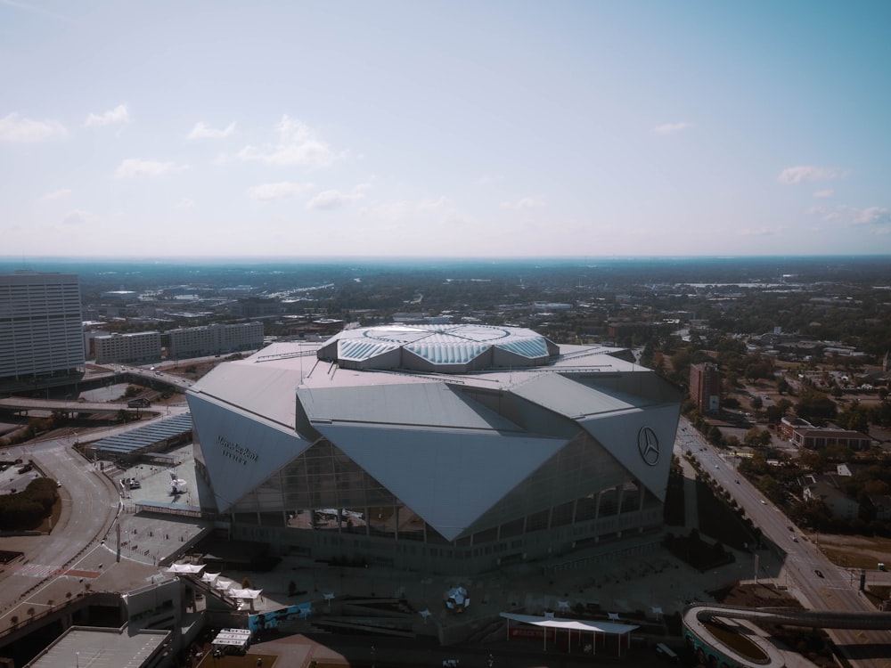 an aerial view of a large building with a domed roof