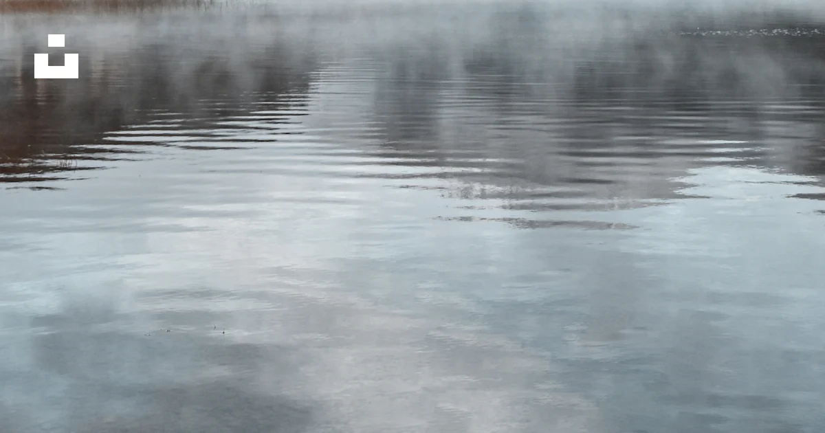 Code Backround Portrait A body of water with mountains in the background - Free Photo on Unsplash