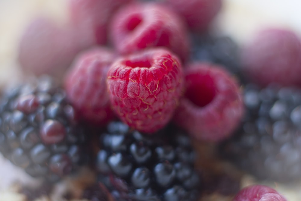 a close up of berries and other fruits