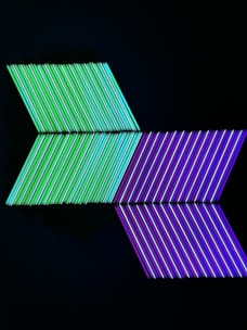 Abstract graphic of layered arrows symbolizing strategic academic planning.