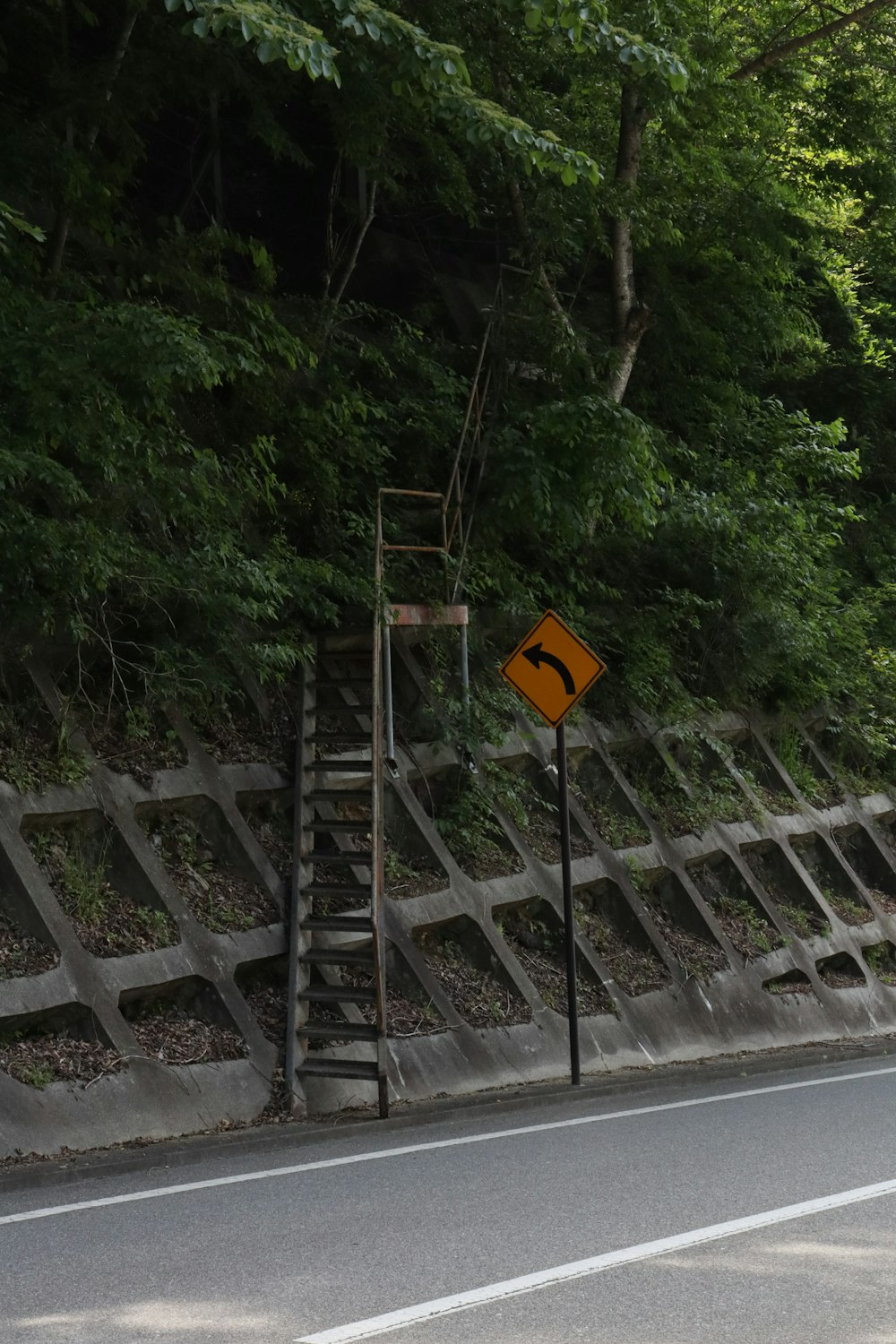 a street sign sitting on the side of a road