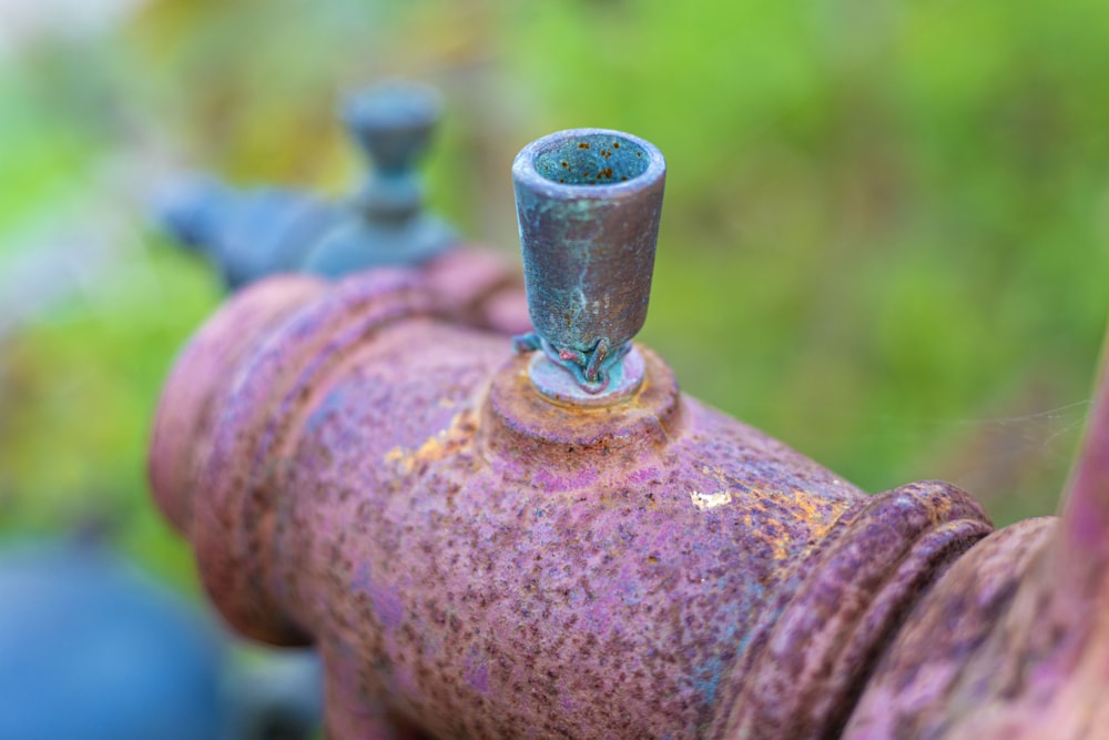 a close up of an old rusty fire hydrant