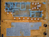 an aerial view of a construction site with concrete blocks