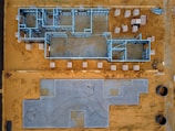 an aerial view of a construction site with concrete blocks