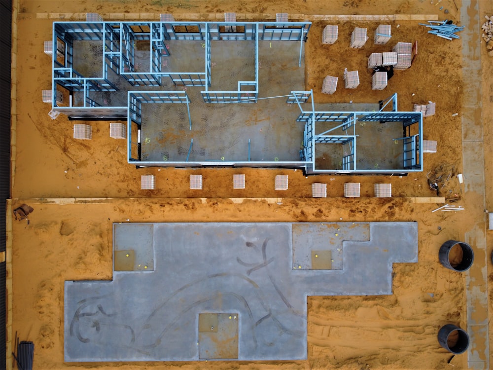 an aerial view of a construction site with concrete blocks