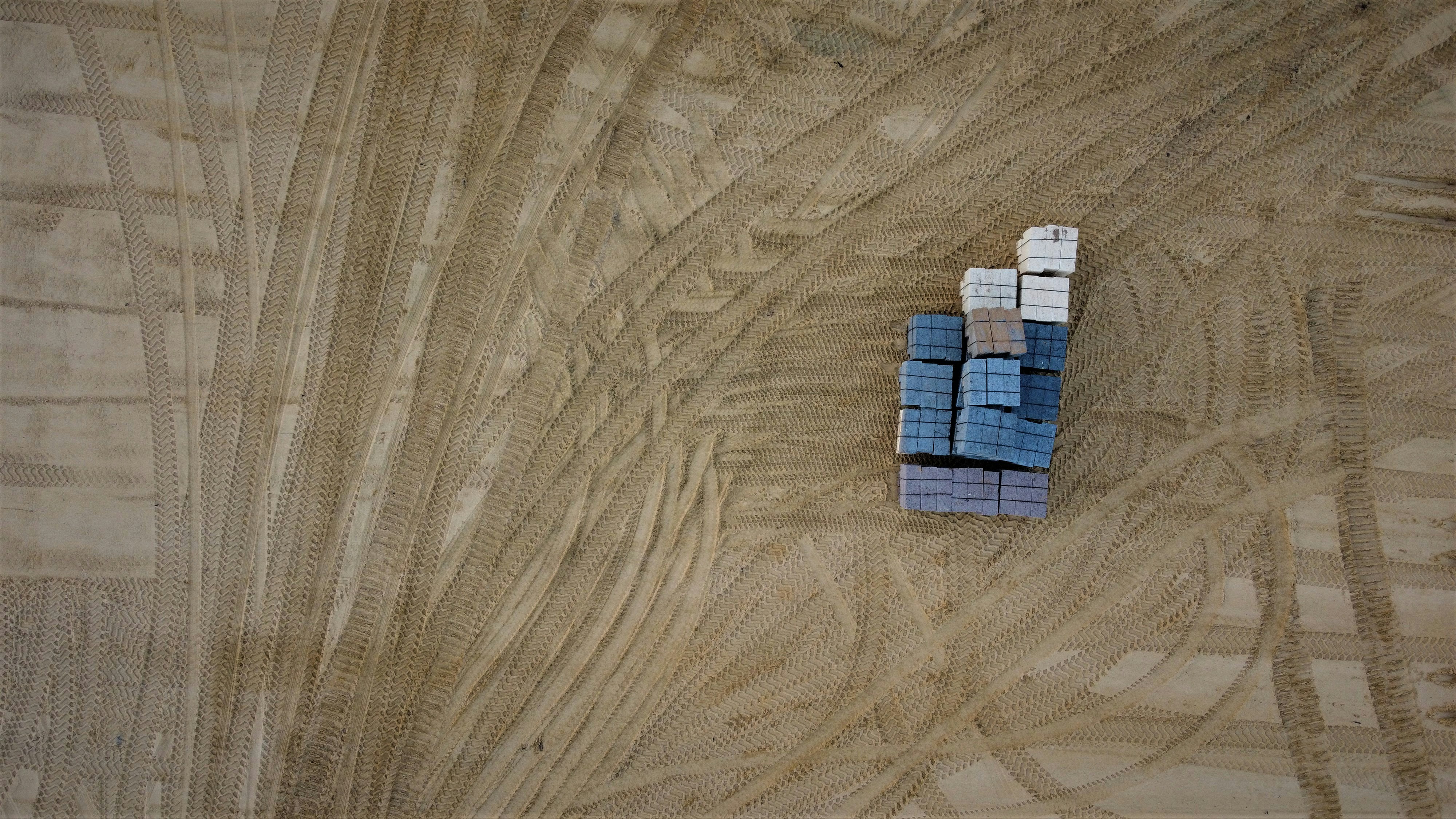 a group of blocks of wood sitting on top of a wooden table