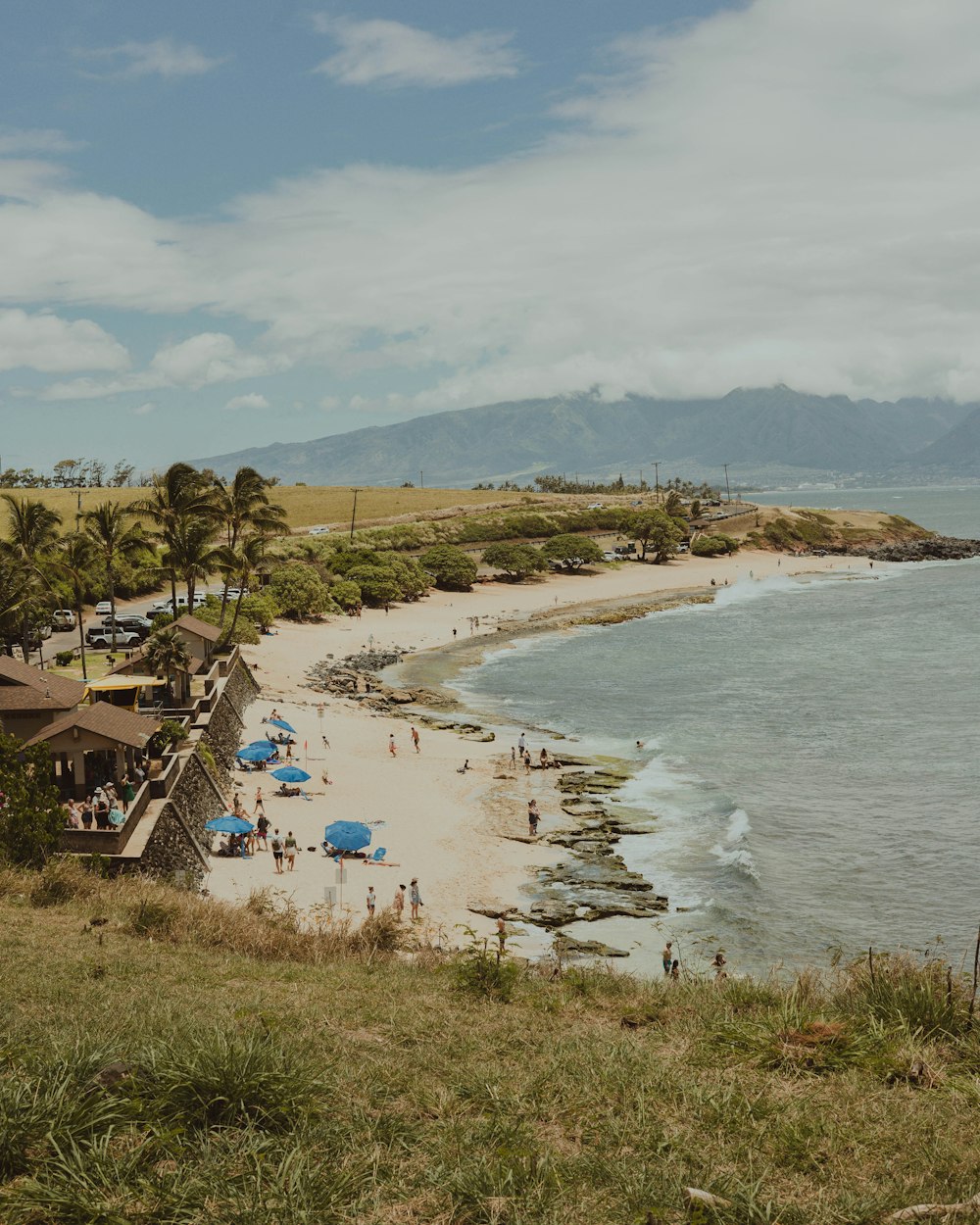 a beach with a lot of people on it