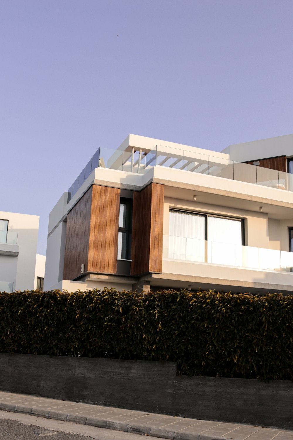 a house with a fence in front of it