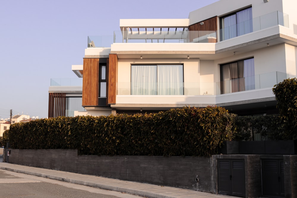 a large house with a lot of windows and balconies