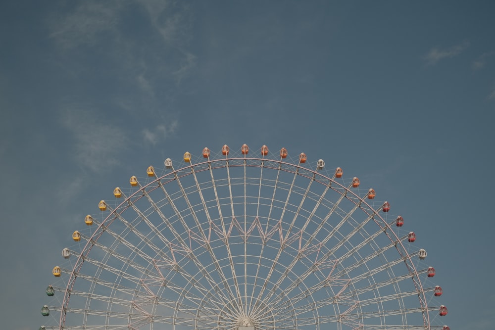 a large ferris wheel with lots of colorful balls on it