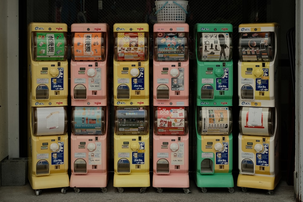 a row of vending machines sitting next to each other