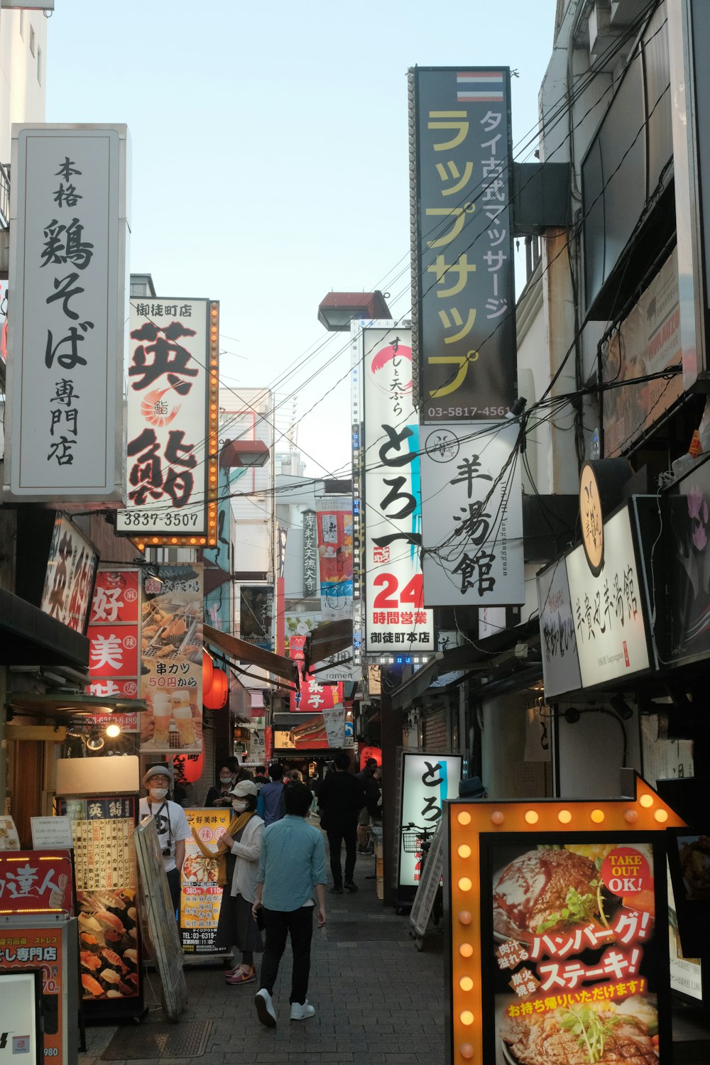 a city street with a lot of signs on it