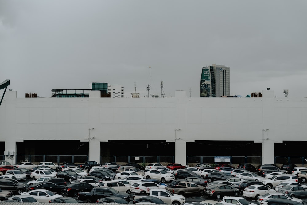 a parking lot filled with lots of parked cars