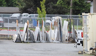 A team from Manpower Fence efficiently installing fencing panels at a large outdoor festival.