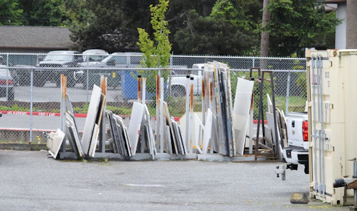 Precast concrete panels lined up and ready for installation in an industrial yard.