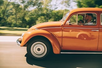 A family happily driving their new car, representing car loans.
