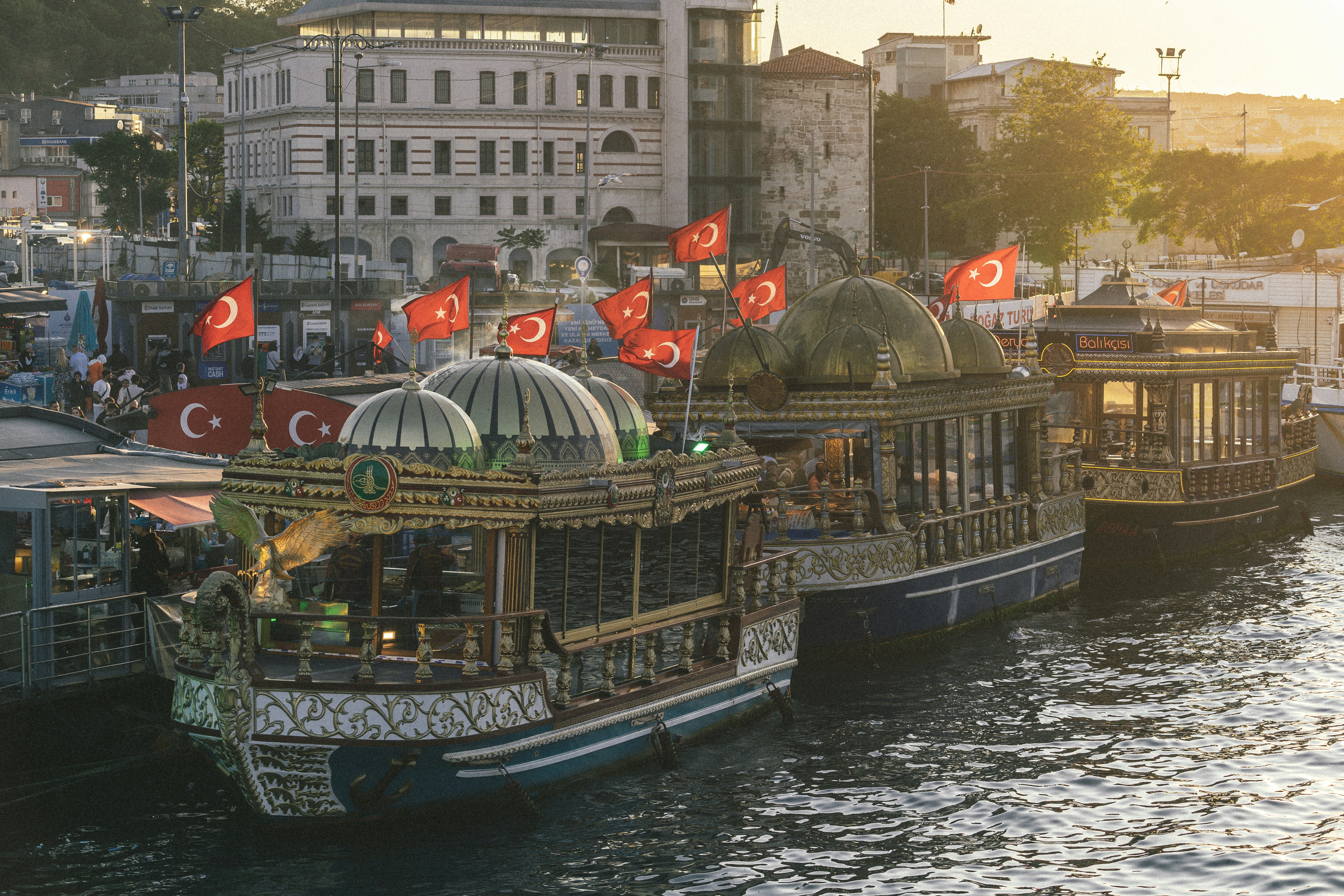 a group of boats that are sitting in the water