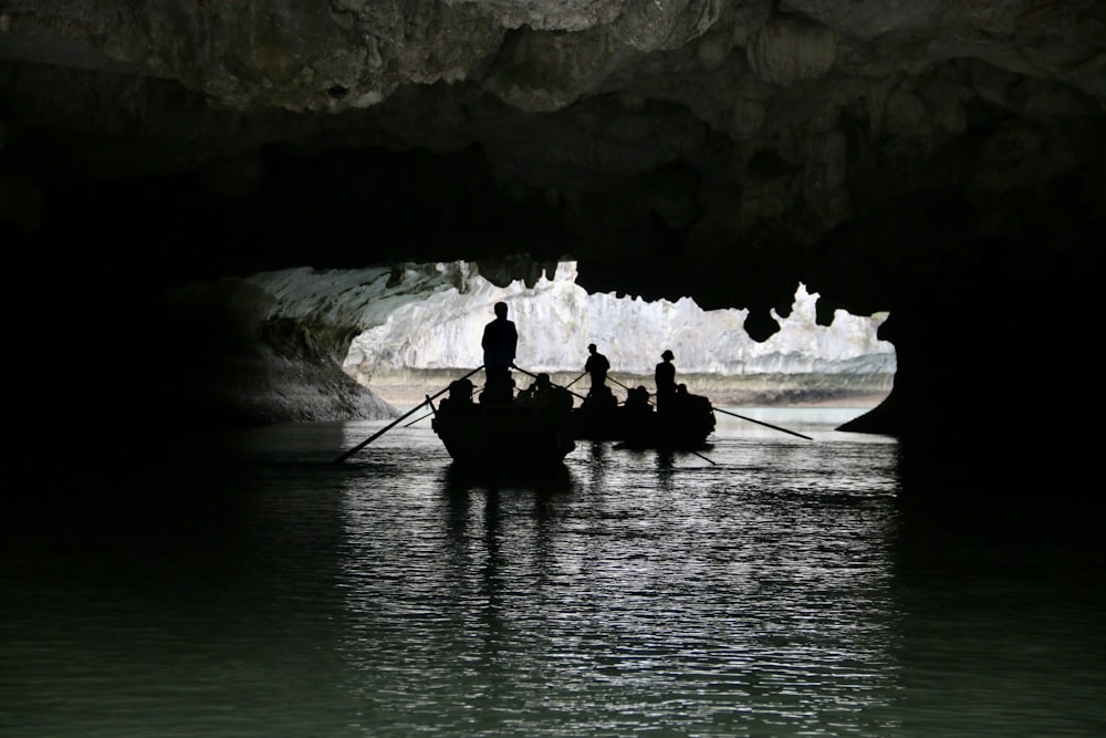 a group of people riding on the back of a boat