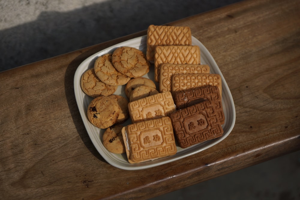 a plate of cookies and cookies on a table