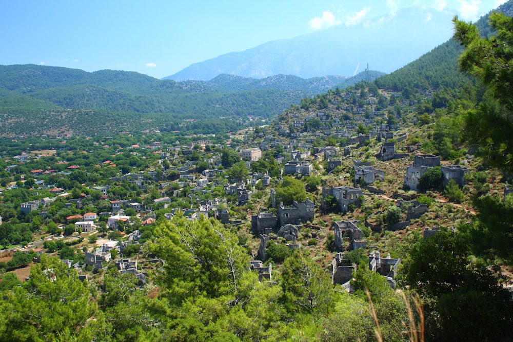 a view of a small village in the mountains