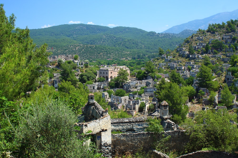 a view of a village in the mountains