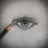 A detailed pencil drawing of a human eye on paper. The eye is shaded intricately with visible eyelashes and a well-defined pupil. A sharpened pencil is positioned as if it is actively drawing the eye.
