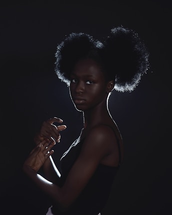 A stylish afro hairstyle showcasing creativity and elegance.