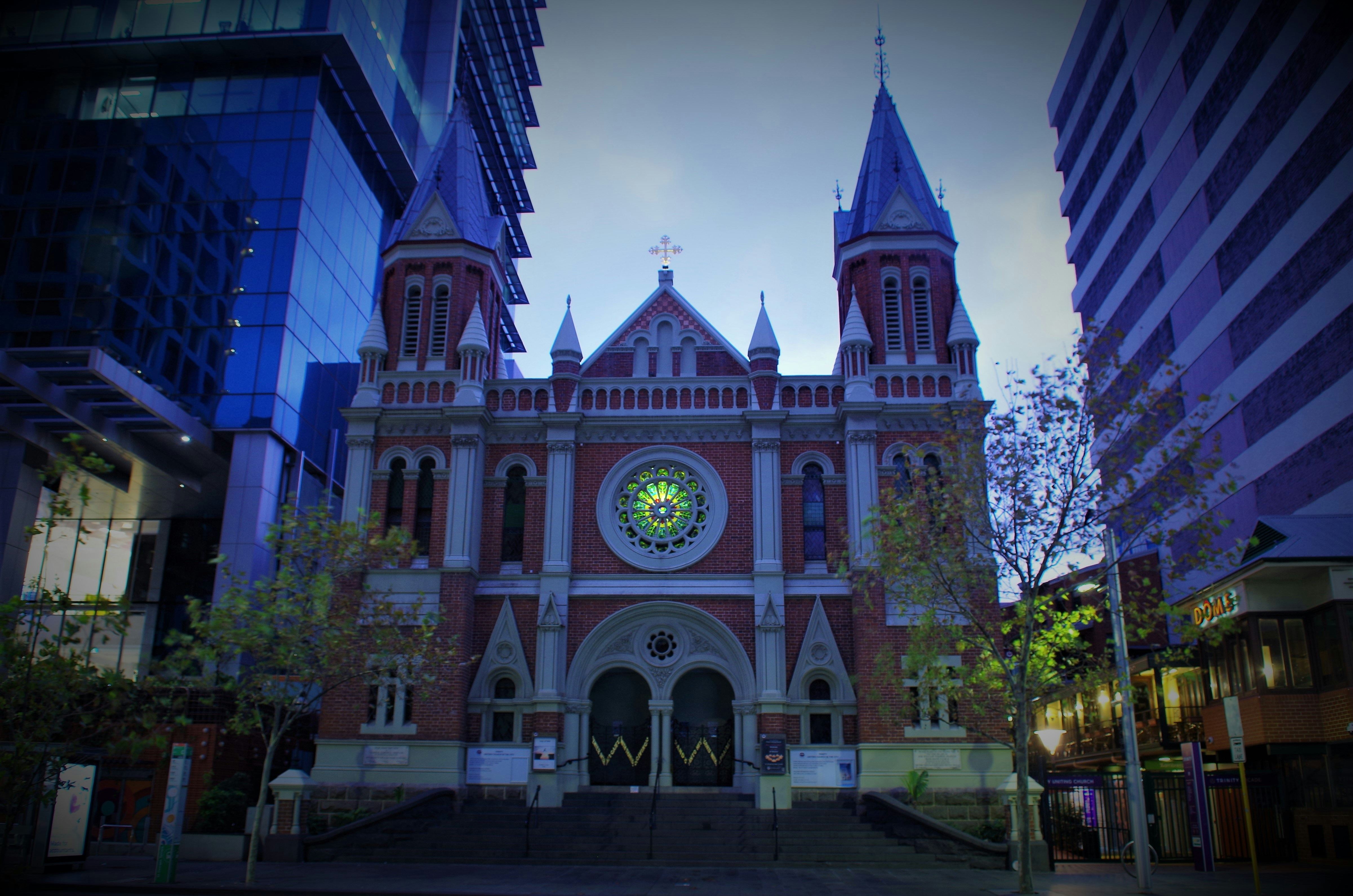 a large building with a clock on the front of it