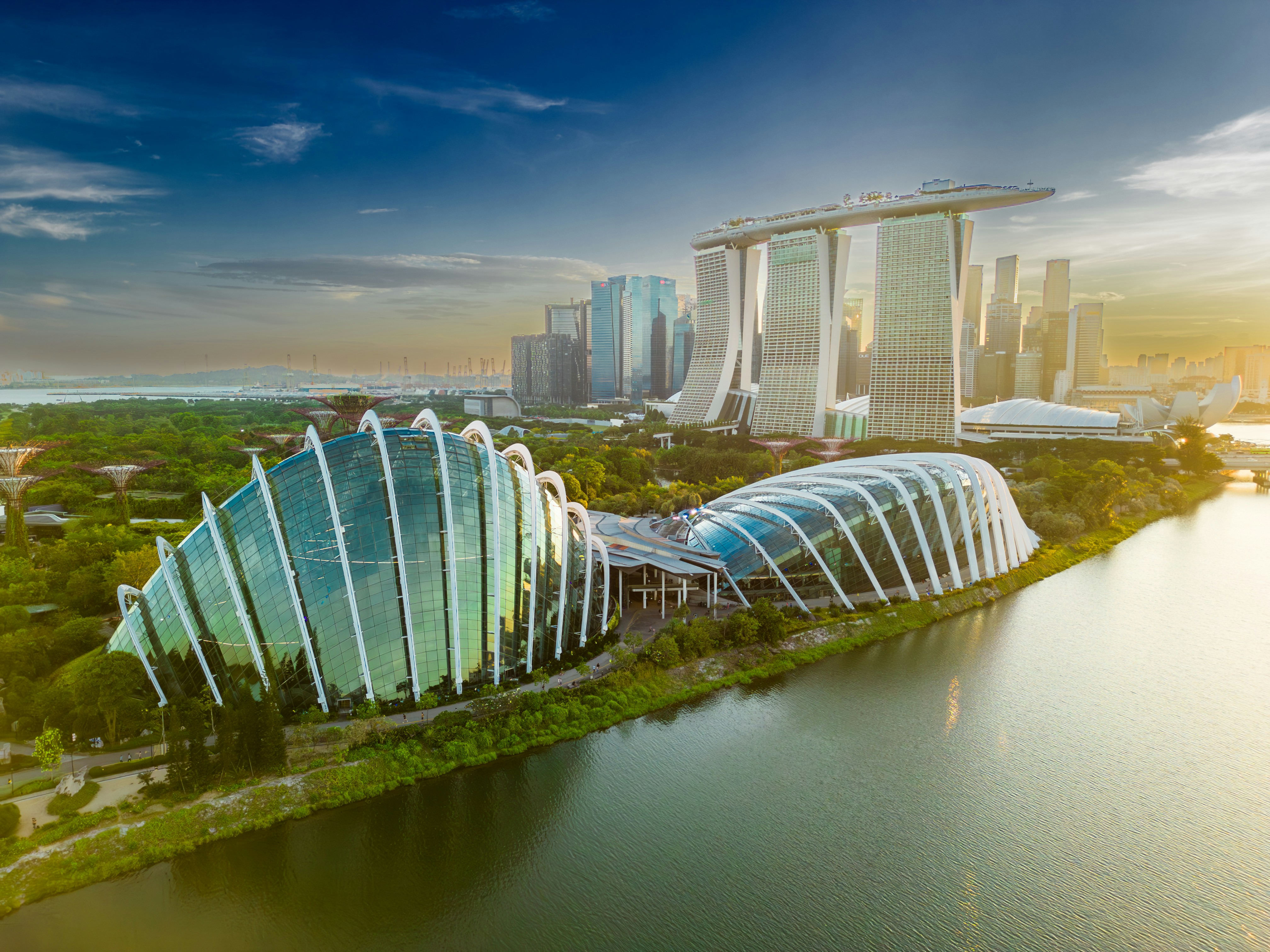 an aerial view of a city with a river running through it